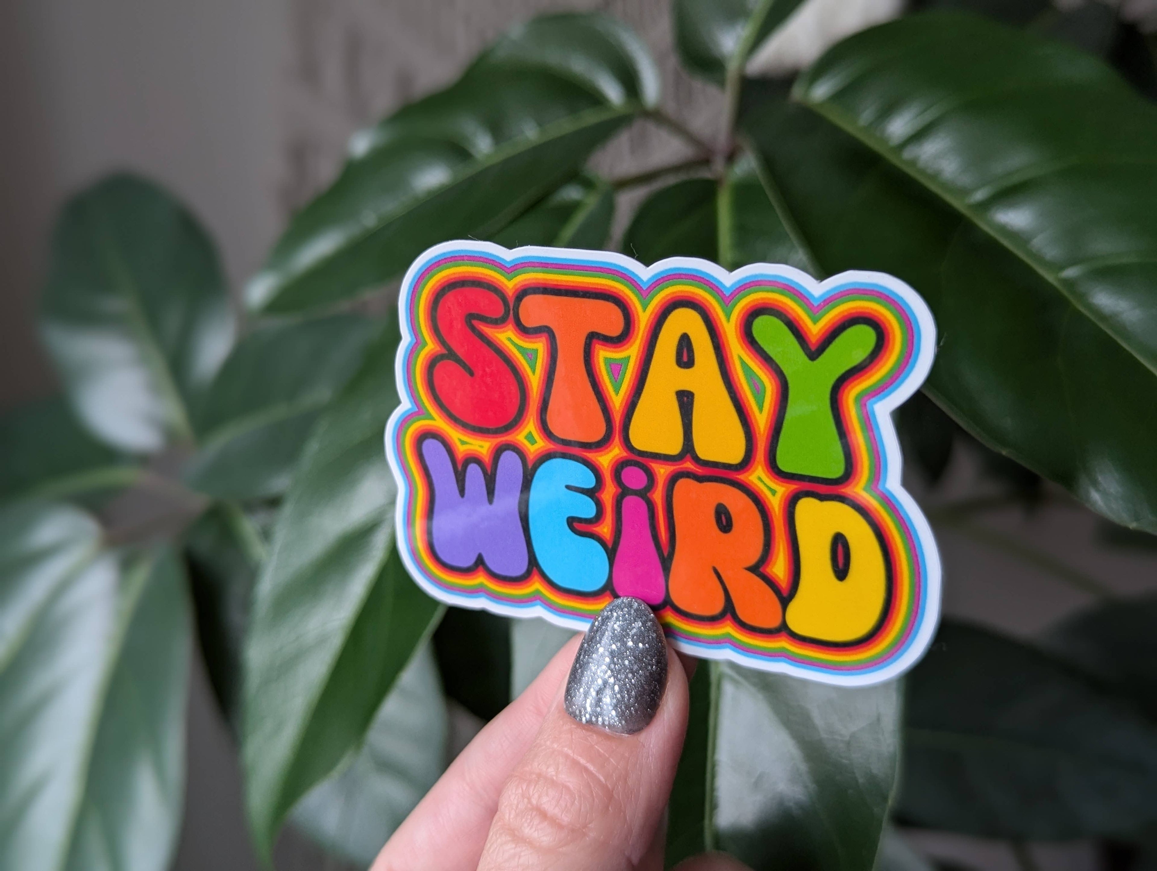 Stay weird vinyl sticker, colourful hippie trippy merch: Loose
